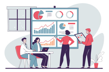 Business meeting in an office with team analyzing data on a large monitor while utilizing laptops and tablets for collaboration