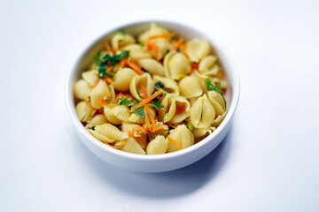 Top View of Fresh Vegetable Pasta in White Bowl with Copy Space