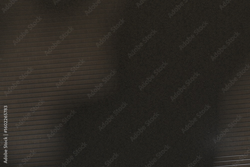 Wall mural dark brown background with horizontal lines fading into a mottled, granular area. the lines suggest 