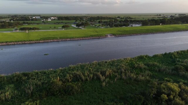 aerial turning to show Pump Station S-3. Water Management District, Lake Okeechobee, Florida