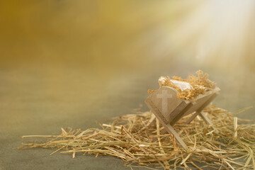 Birth of Jesus Christ in Bethlehem, light is shinning on the manger, religion and faith of...