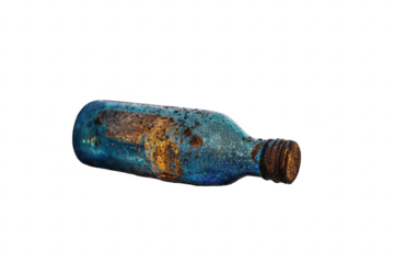 Rusty blue glass bottle, weathered