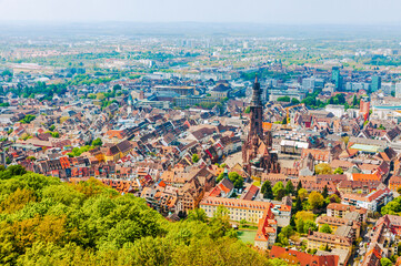 Aerial view of Freiburg im Breisgau, Germany, showcasing the historic Freiburg Munster and charming...