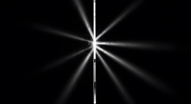 Sacred light emerging through a cracked door in a dark environment