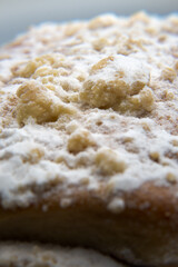 Crumble on yeast dough, sweet delicacies.
