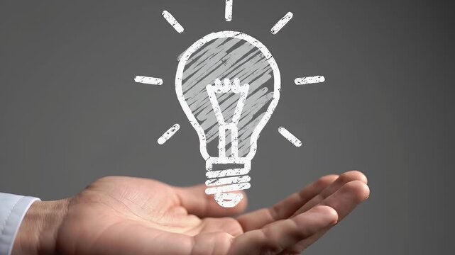 Hand Presenting a Chalk Drawn Lightbulb on Gray Background Symbolizing Idea Generation and Creative Solutions