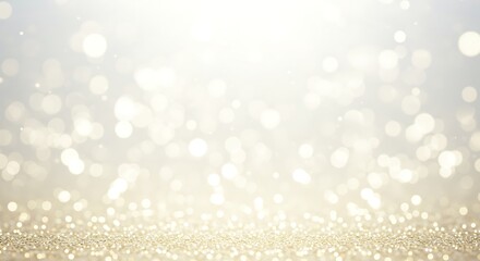 A soft and dreamy bokeh background features golden and white lights creating a