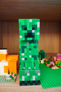 Lego Minecraft Creeper Figure on a Wooden Shelf