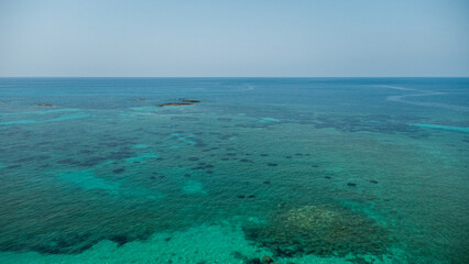 Turquoise Sea and Reef Shadows – Aerial View of the Mediterranean off Calabria, Italy