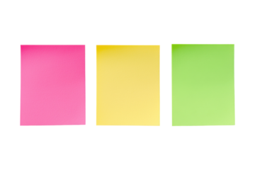 Colorful Sticky Notes: Three vibrant sticky notes, a trio of pink, yellow, and green, create a visually striking arrangement.