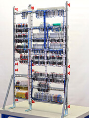 View from the back of the electrical panel. Connection of electronic modules using copper...