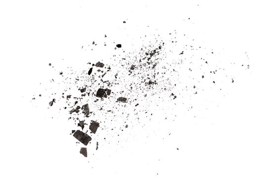 Scattered charcoal dust and broken, isolated texture