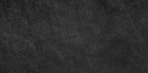 Obraz premium Dark concrete wall grunge texture rough blackboard and chalkboard grungy wall backdrop surface. dark wide panorama picture black wall texture rough concrete floor, old grunge background. 