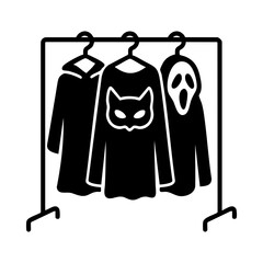 Halloween costumes hanging on rack for party