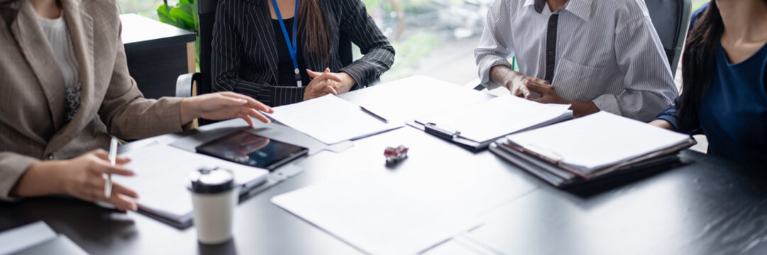 Sales manager giving advice application form document, considering mortgage loan offer for car and house insurance. - Powered by Adobe