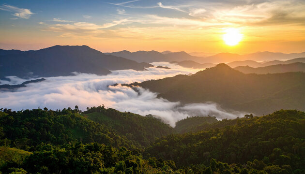 A breathtaking sunrise illuminates rolling mountains and a sea of clouds, creating a serene and majestic landscape.