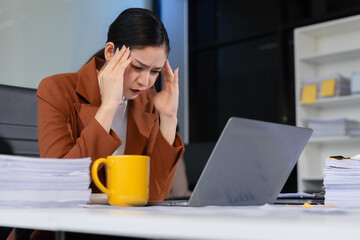 stressed woman working in the office. Businesswoman thinking too much work concept in the office.