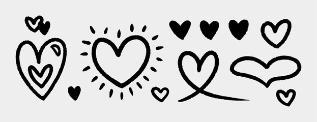A set of cute ink hearts isolated on a gray background. Vector hand-drawn illustration in doodle style. Perfect for cards, decorations, various designs.