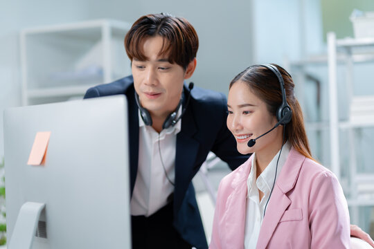female asian operator taking job training,Leadership,training and mentor in call center coaching a telemarketing employee for quality customer services,insurance agent support