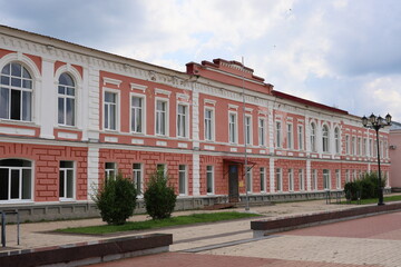 The facade of a historic building displays an impressive architectural style that captivates all