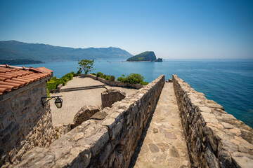 Citadel fortress and panoramic terrace in Budva, Montenegro. View of historic architecture and coastal heritage site.