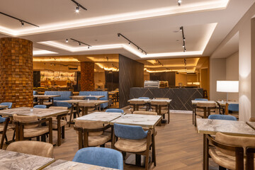 Interior of a large modern hotel restaurant
