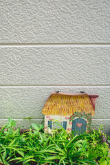 Miniature Garden House Decoration with Green Plants.