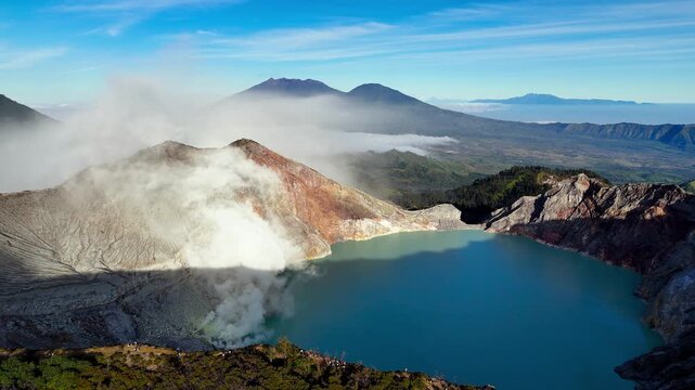 Aerial view of Kawah Ijen volcano and the rising sulfurous fumes in the caldera.