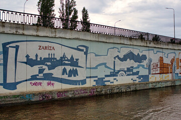 A wall with graffiti on it and the word Zariza written on it