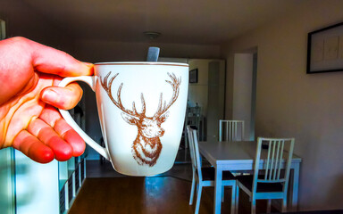 Coffee cup with deer on the table in Austria.