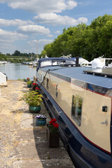 Barges moored in the Old Arm of the Gloucester Sharpness Canal at Sharpness, Gloucestershire, United Kingdom