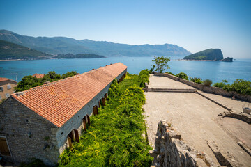 Citadel fortress and panoramic terrace in Budva, Montenegro. View of historic architecture and coastal heritage site.