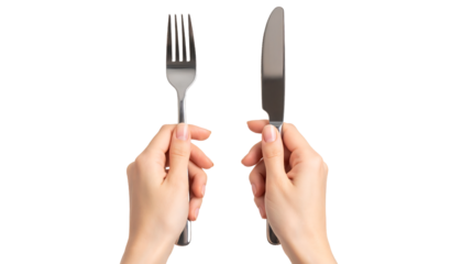 Two hands hold a fork and knife separately, symbolizing readiness for dining.
