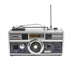 Vintage silver portable radio.  Front view of a boxy, silver-toned portable radio with antenna.  Features various knobs, buttons, and a circular light.  Dark gray panels