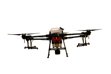 Agricultural technology smart farm concept. Farmer technicians remotely fly agricultural drones to fly to spray fertilizer in fields.