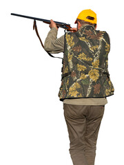 Hunter aiming with rifle while standing against sky