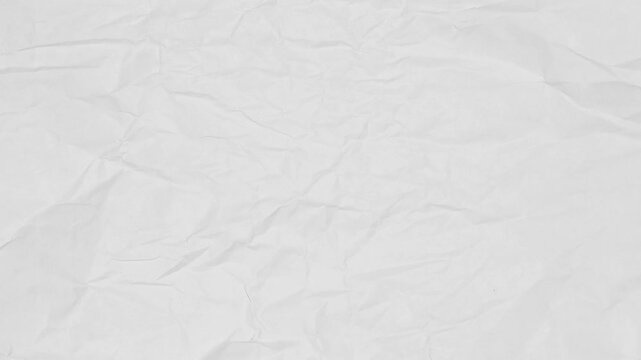 Wrinkled texture on paper a close up shot of a delicately textured, creased sheet of paper showcases subtle shadows and unique folds.