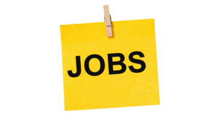 Yellow note with the word "JOBS" printed in bold black letters clipped by a wooden clothespin.