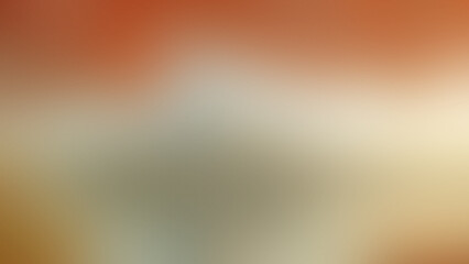 Photo of a warm gradient of orange beige and brown with a soft grainy texture