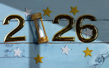 Golden Numbers Reflecting New Year Transition with Hourglass and Star Decor