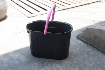 Black and Pink Plastic Bucket