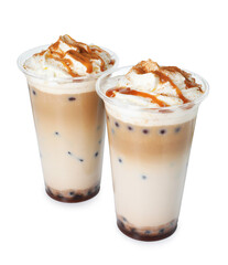 Tasty milk bubble tea in plastic cups isolated on white