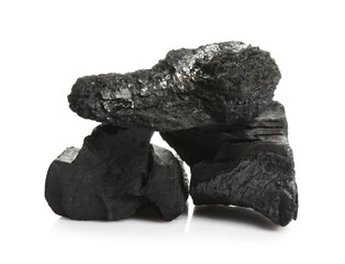 Pieces of black coals isolated on white