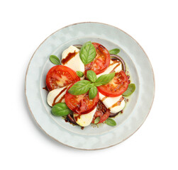 Tasty salad Caprese with mozzarella, tomatoes, basil and spices isolated on white, top view
