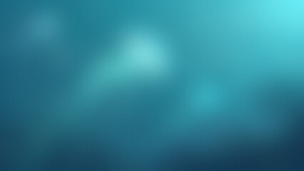 Photo of a soft blurred gradient of teal and blue with subtle light effects