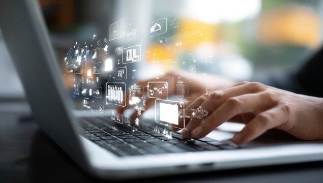 Hands type on a laptop keyboard surrounded by glowing data visualizations representing modern communication and digital information flow. - Powered by Adobe