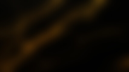 Photo of diagonal golden light streaks across a dark textured background