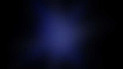 Photo of a dark background with a soft blue gradient emanating from the center