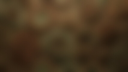 Photo of a soft focus textured background with earthy brown and green tones