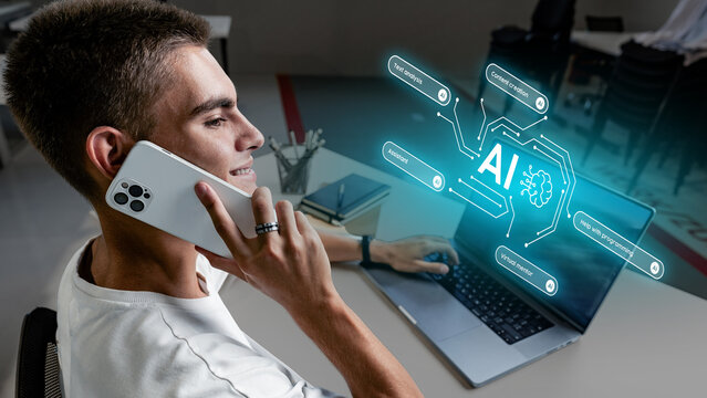 Young man engages in conversation while using AI technology for work in a modern office setting